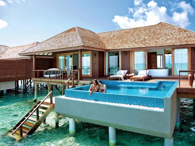 Hideaway beach resort deluxe water villa with pool casal